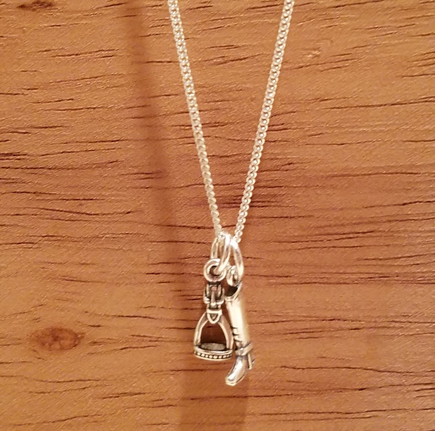 horse stirrup and boot pendant