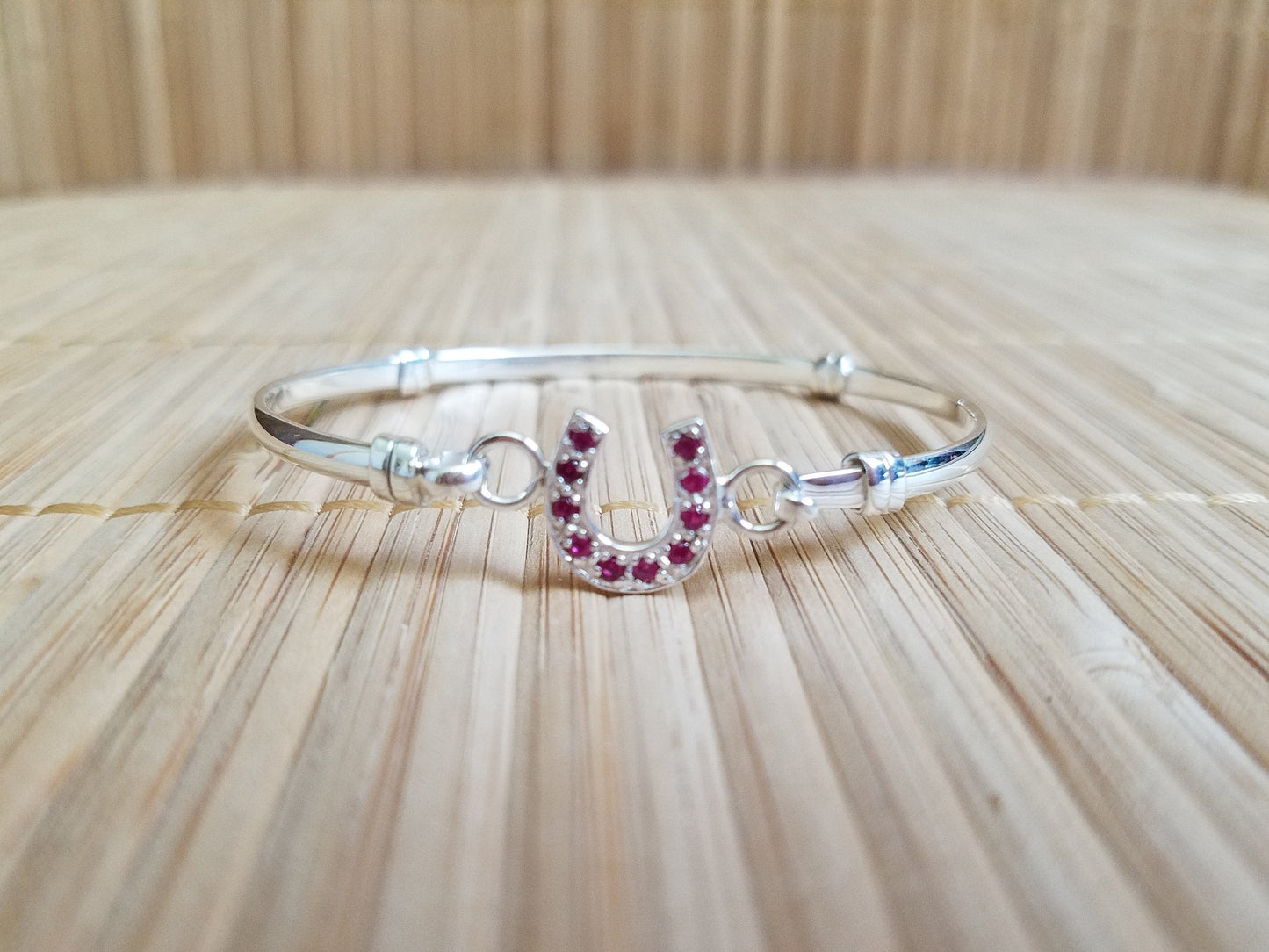 red cz horse shoe bangle