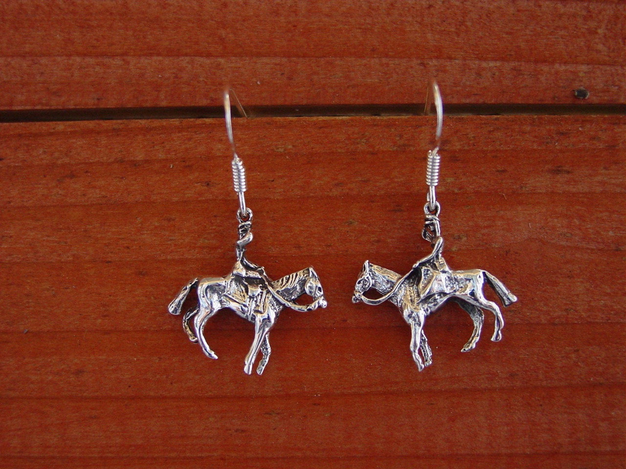 side saddle women riding silver
