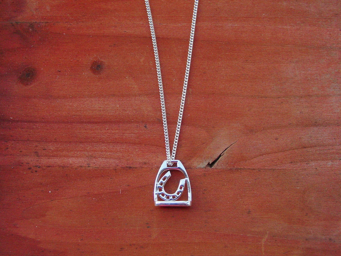 horseshoe stirrup pendant