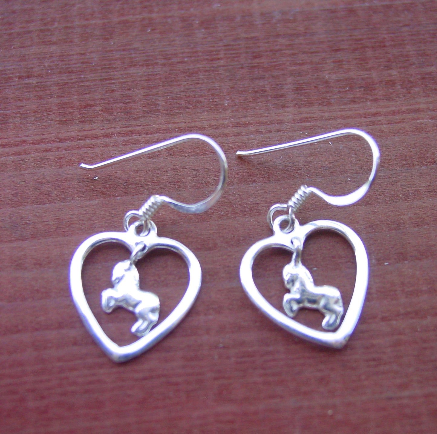 galloping horse heart earrings