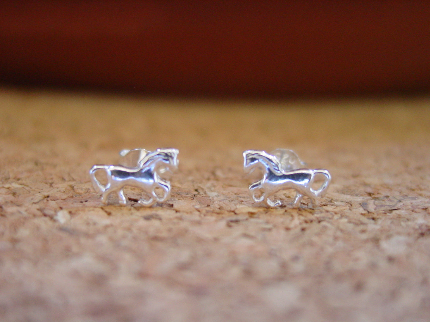 horse walking earrings