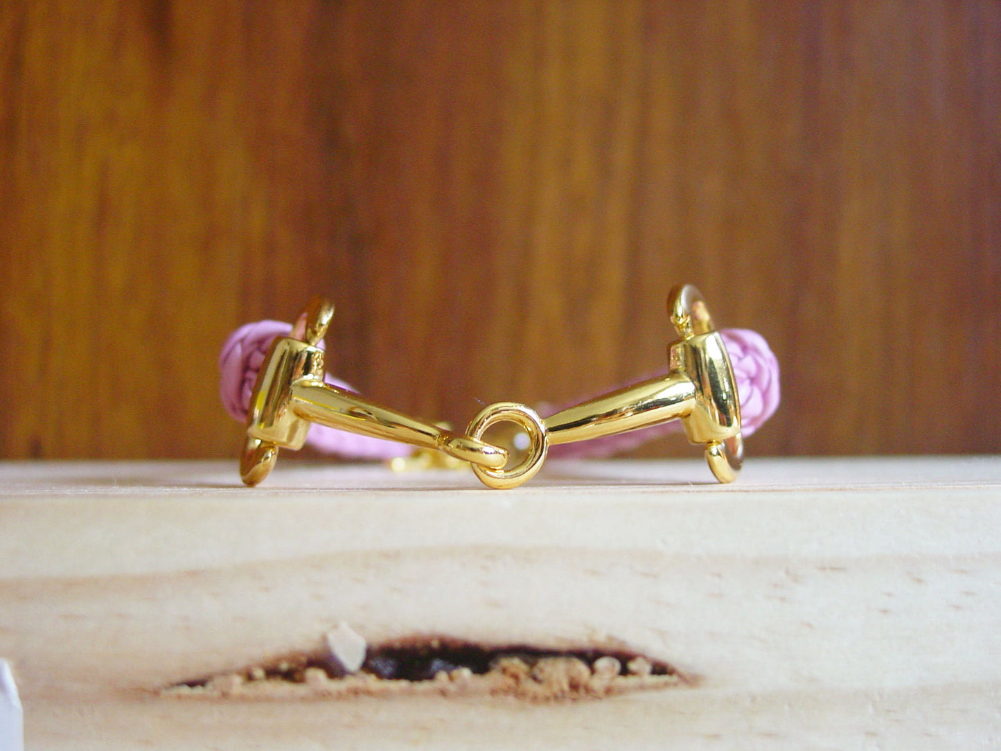 gold bit with pink flex leather bracelet