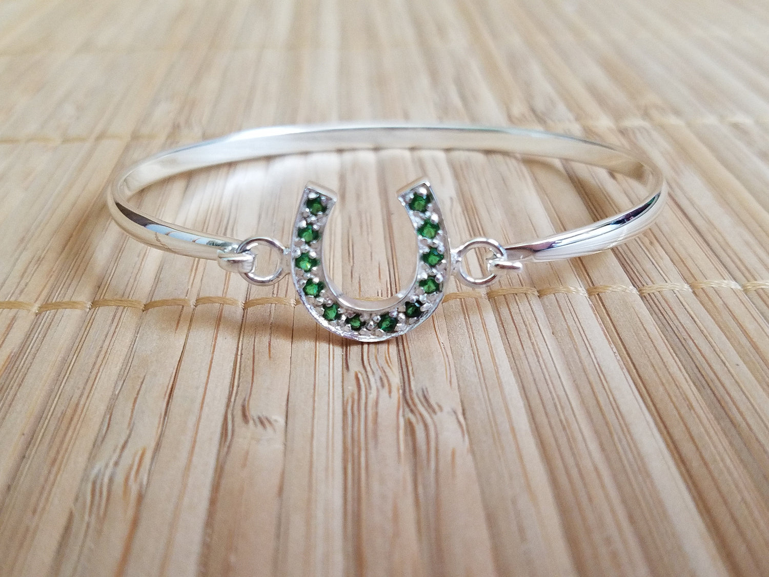 emerald horseshoe jewelry