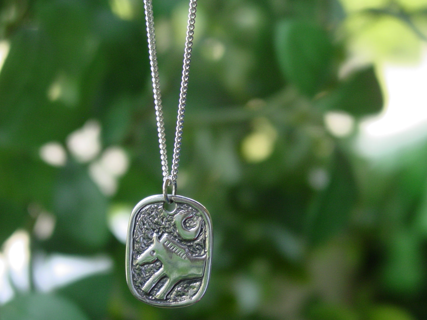 equestrian Indian horse pendant