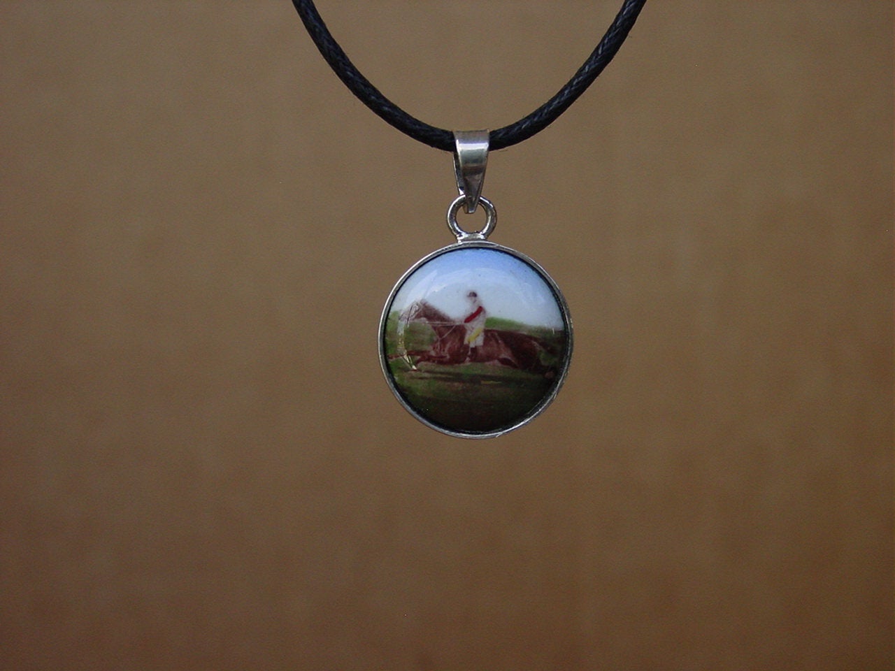 galloping horse pendant