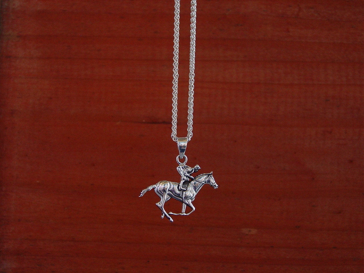 horse jockey pendant