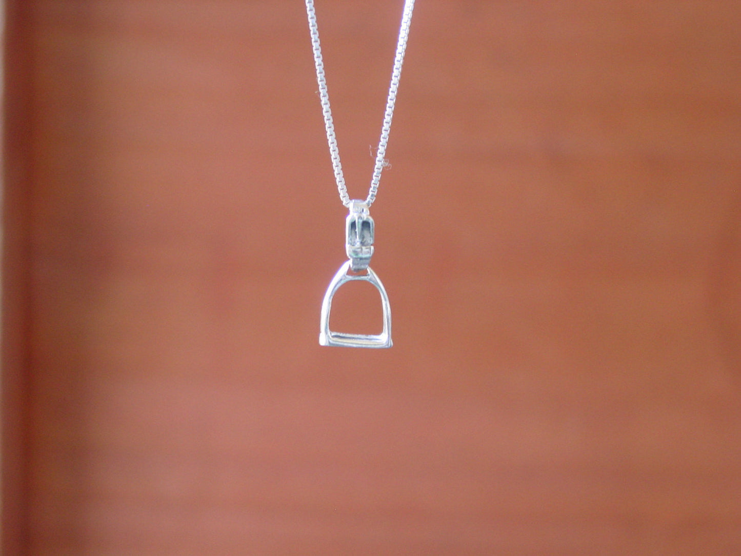 tiny stirrup horse pendant